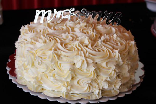 Mr. and Mrs. white roses cake